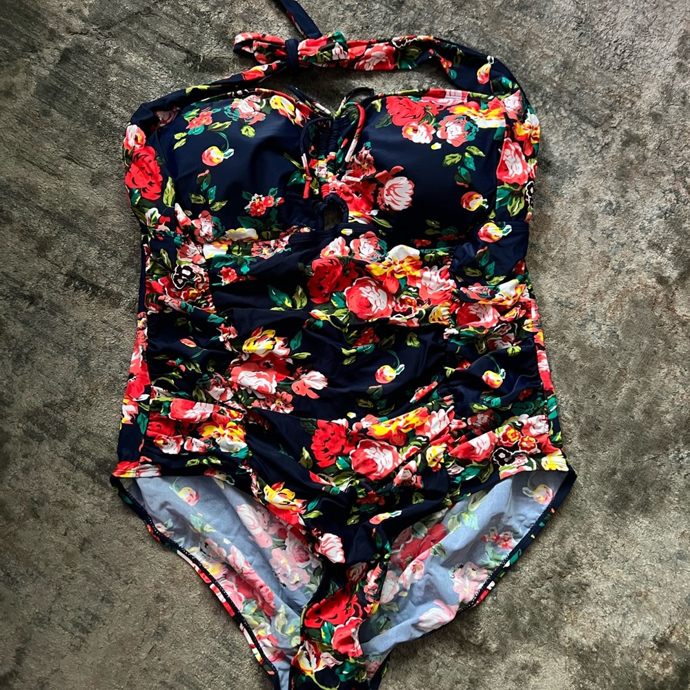 Brand new, never worn one piece swimsuit